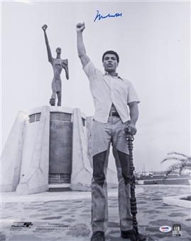 Muhammad Ali Signed 16 x 20 Black & White Photo In Front of Le Militant Statue In Zaire (PSA/DNA GEM MT 10)